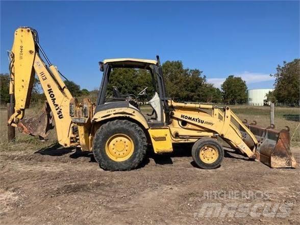 Komatsu WB140 Экскаваторы-погрузчики