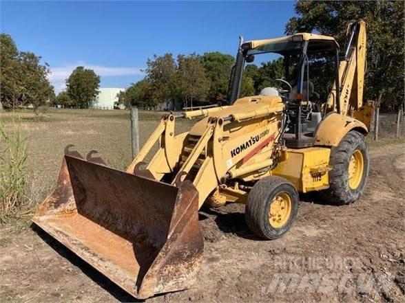 Komatsu WB140 Экскаваторы-погрузчики