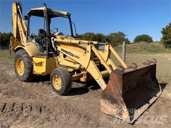 Komatsu WB140 Экскаваторы-погрузчики