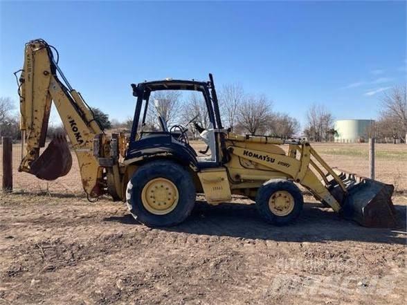 Komatsu WB140 Экскаваторы-погрузчики