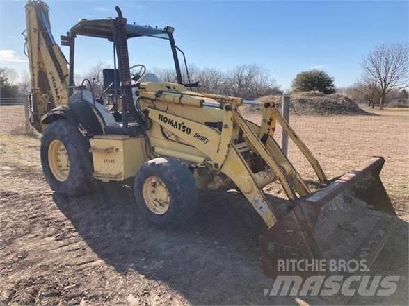Komatsu WB140 Экскаваторы-погрузчики