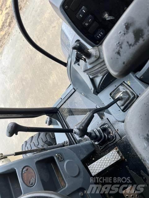 Terex TLB840R Экскаваторы-погрузчики