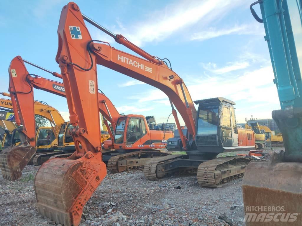 Hitachi ZX 210 Гусеничные экскаваторы