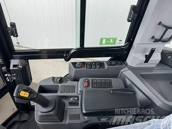 CAT 906 Фронтальные погрузчики