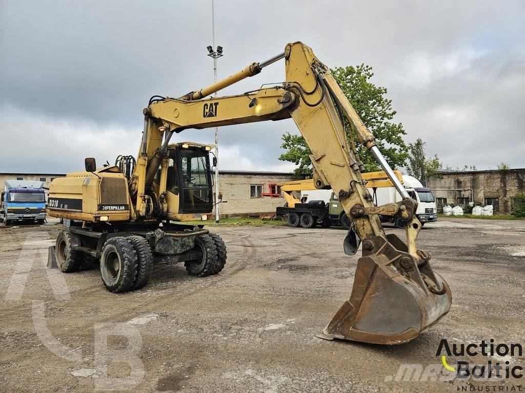 CAT M 318 C Колёсные экскаваторы