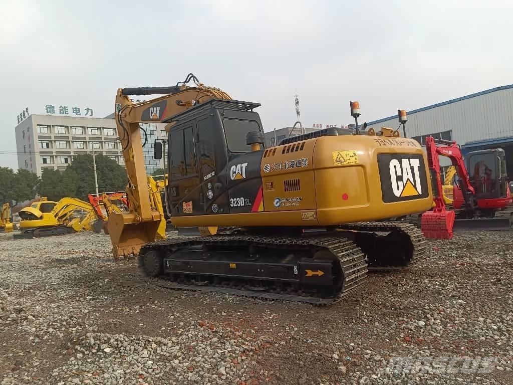CAT 323 D Гусеничные экскаваторы