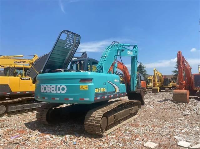 Kobelco SK210 Гусеничные экскаваторы