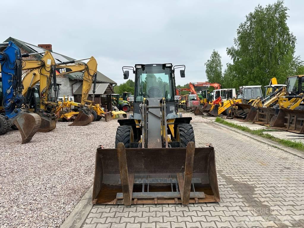 New Holland W 70 TC Фронтальные погрузчики