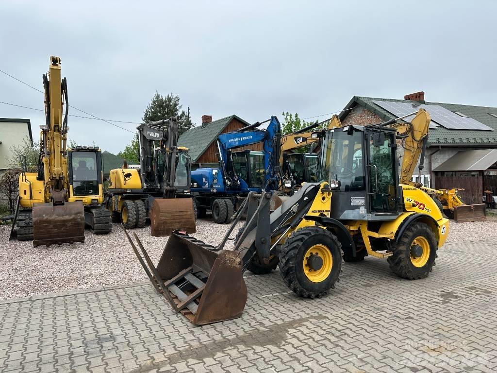 New Holland W 70 TC Фронтальные погрузчики