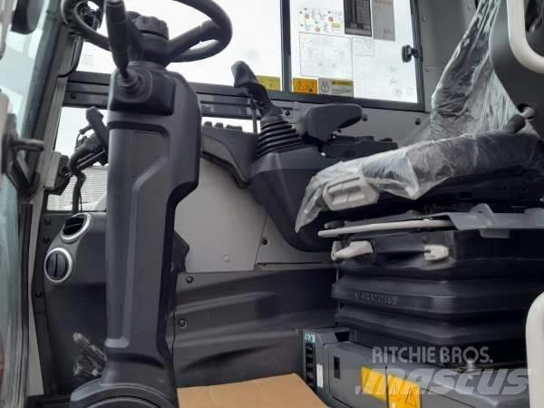 Takeuchi TB 395 W Колёсные экскаваторы