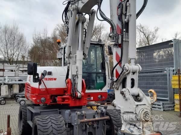 Takeuchi TB 395 W Колёсные экскаваторы