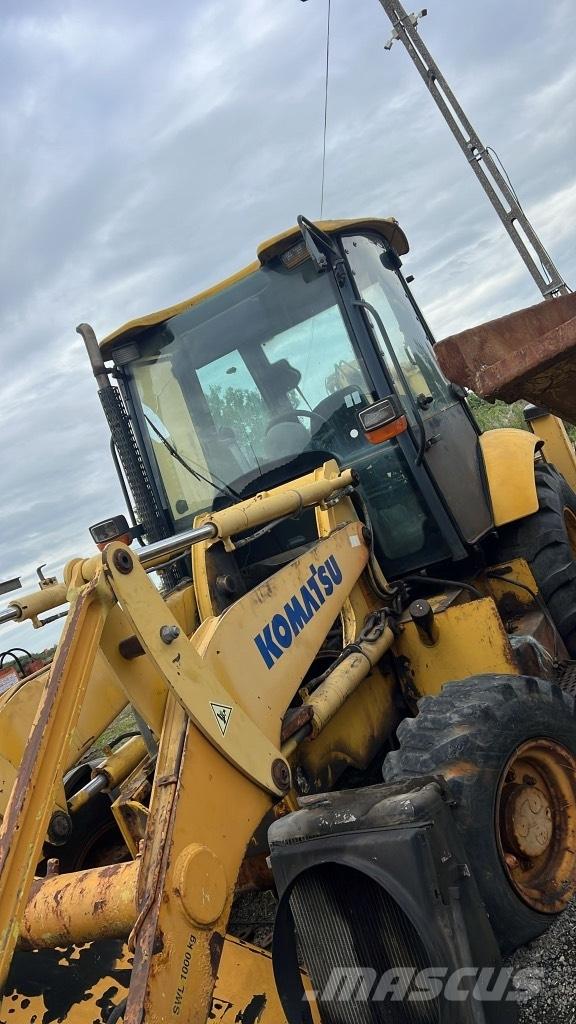 Komatsu WB 93 R Гусеницы и цепи