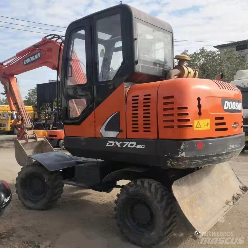 Doosan DX70W-9C Колёсные экскаваторы