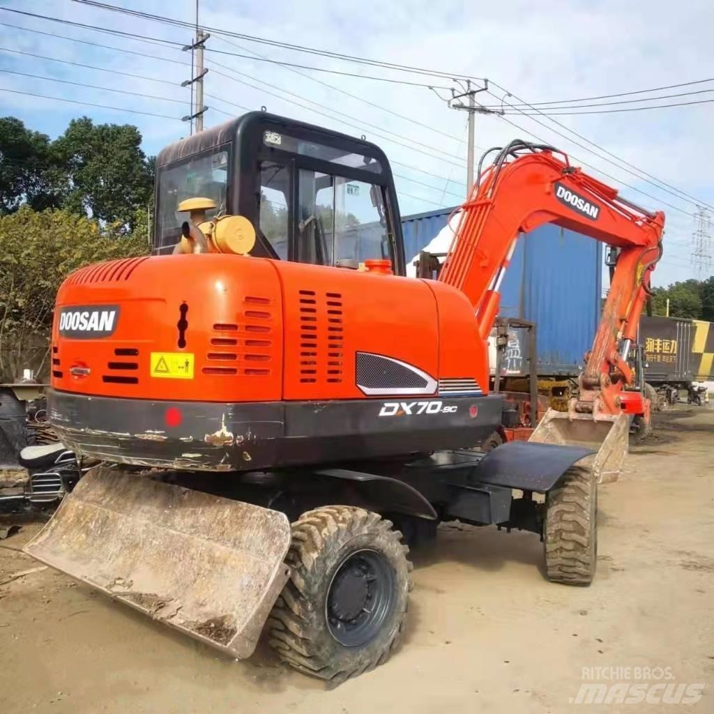 Doosan DX70W-9C Колёсные экскаваторы