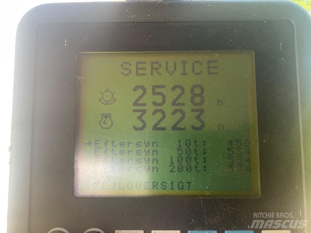 New Holland TX 68 Зерноуборочные комбайны