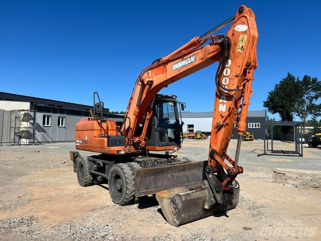 Doosan DX 140 W Колёсные экскаваторы
