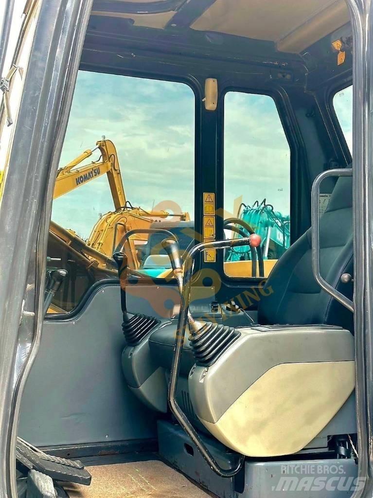 Komatsu PC 60 Гусеничные экскаваторы