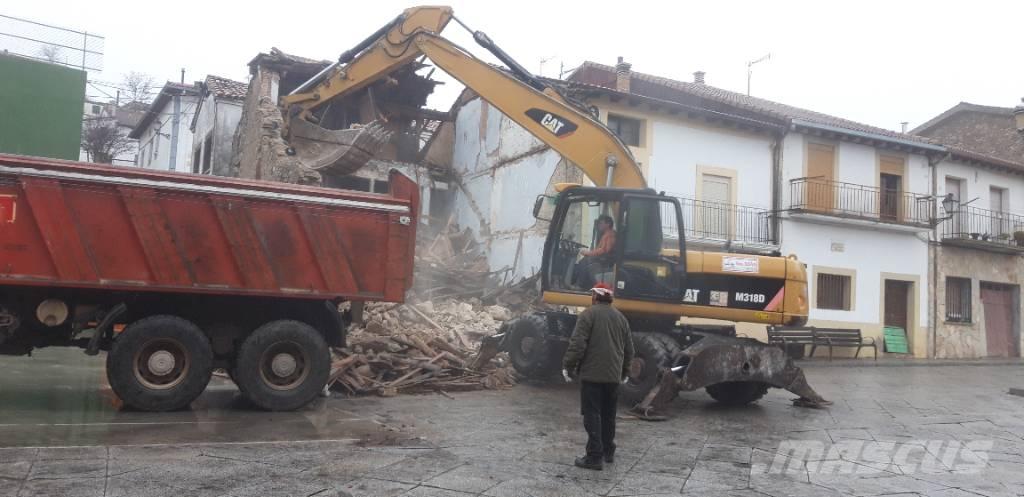 CAT M318d Колёсные экскаваторы