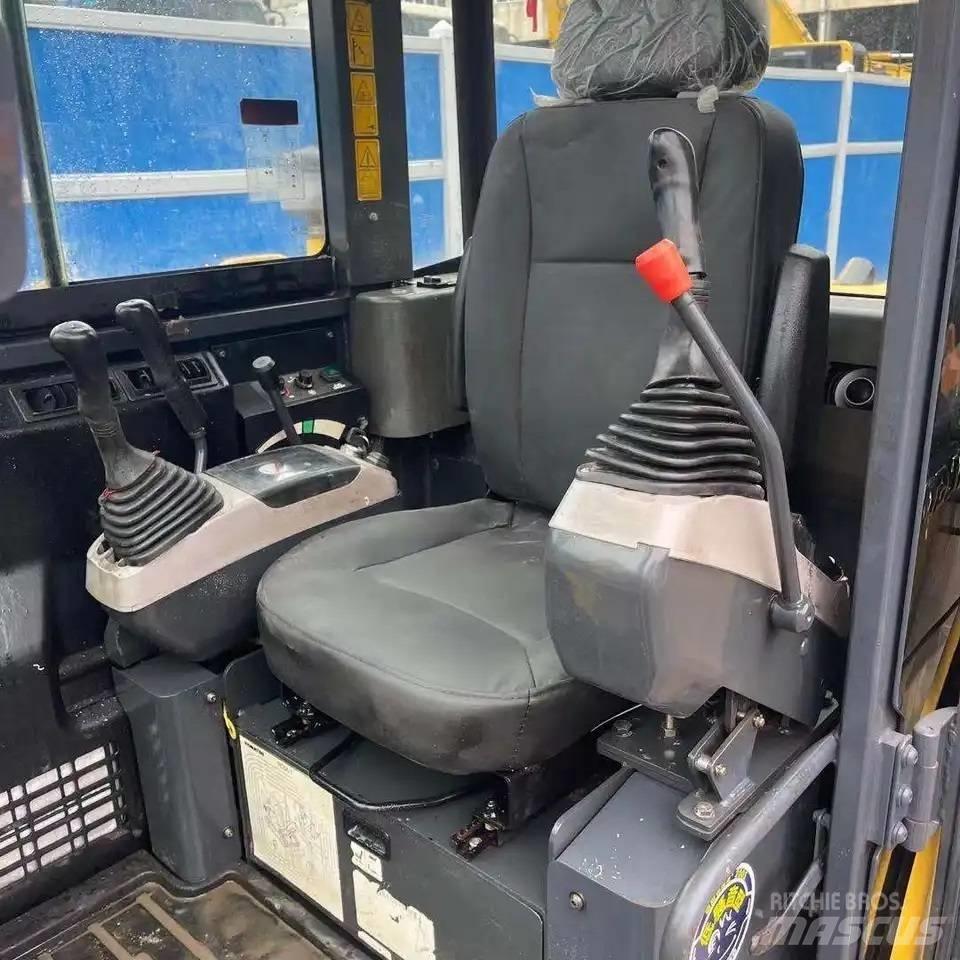 Komatsu PC56-7 Гусеничные экскаваторы