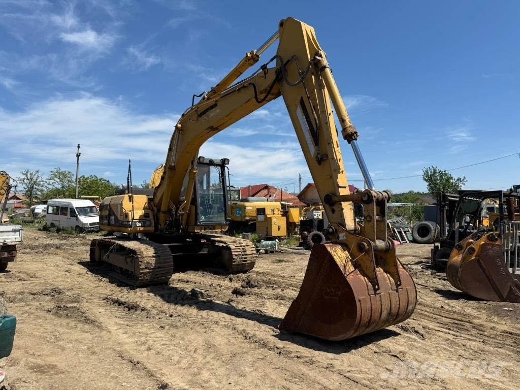 CAT 318 Гусеницы и цепи