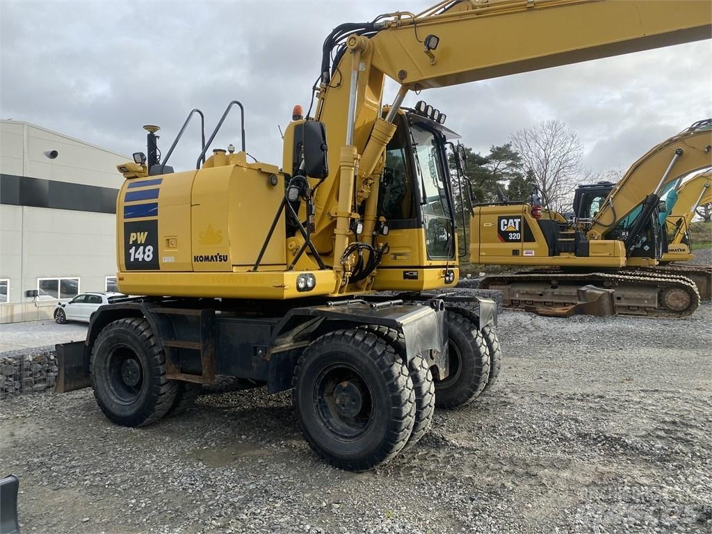 Komatsu PW148-10 Колёсные экскаваторы