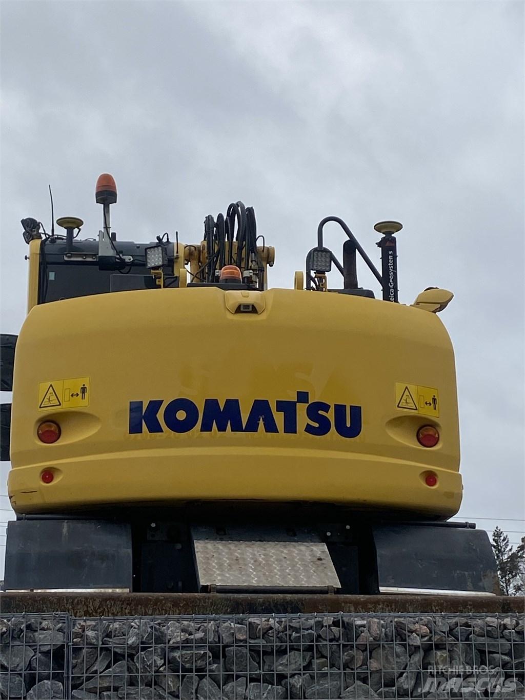 Komatsu PW148-10 Колёсные экскаваторы