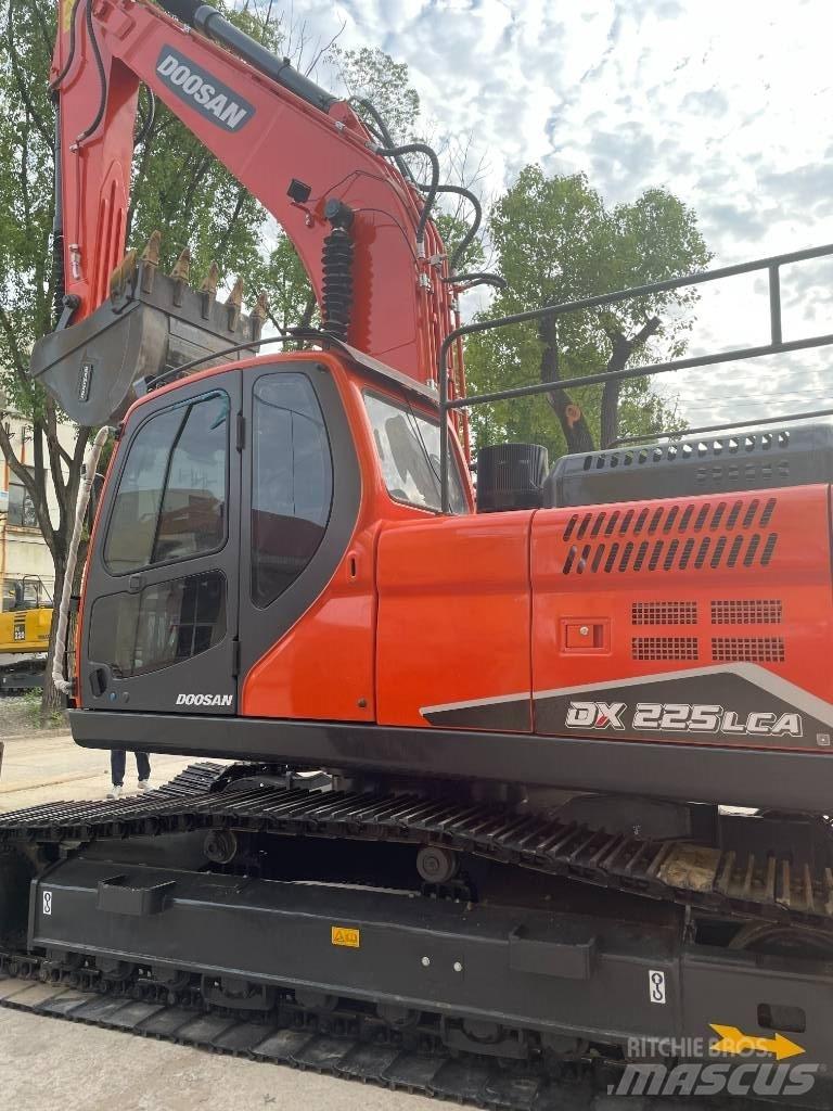 Doosan DX 225 Малые экскаваторы 7т-12т