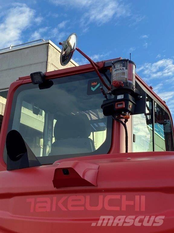 Takeuchi TB 395 W Колёсные экскаваторы