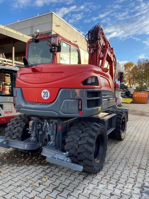 Takeuchi TB 395 W Колёсные экскаваторы