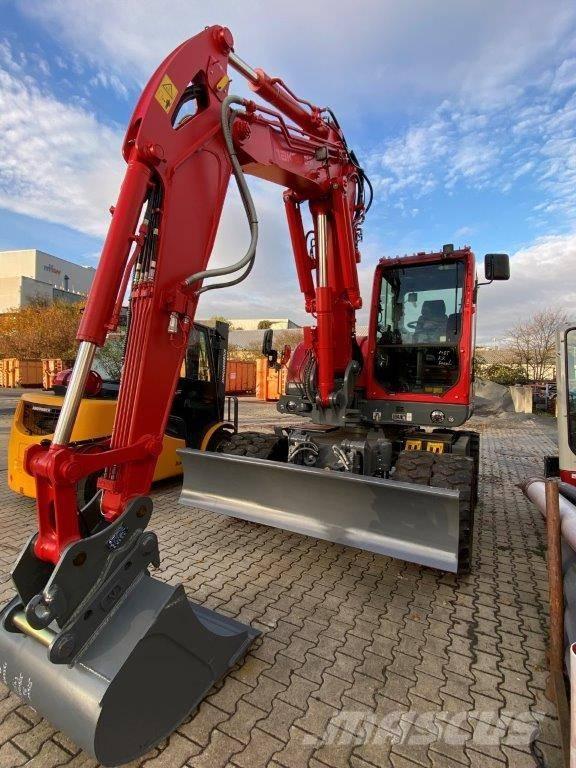 Takeuchi TB 395 W Колёсные экскаваторы