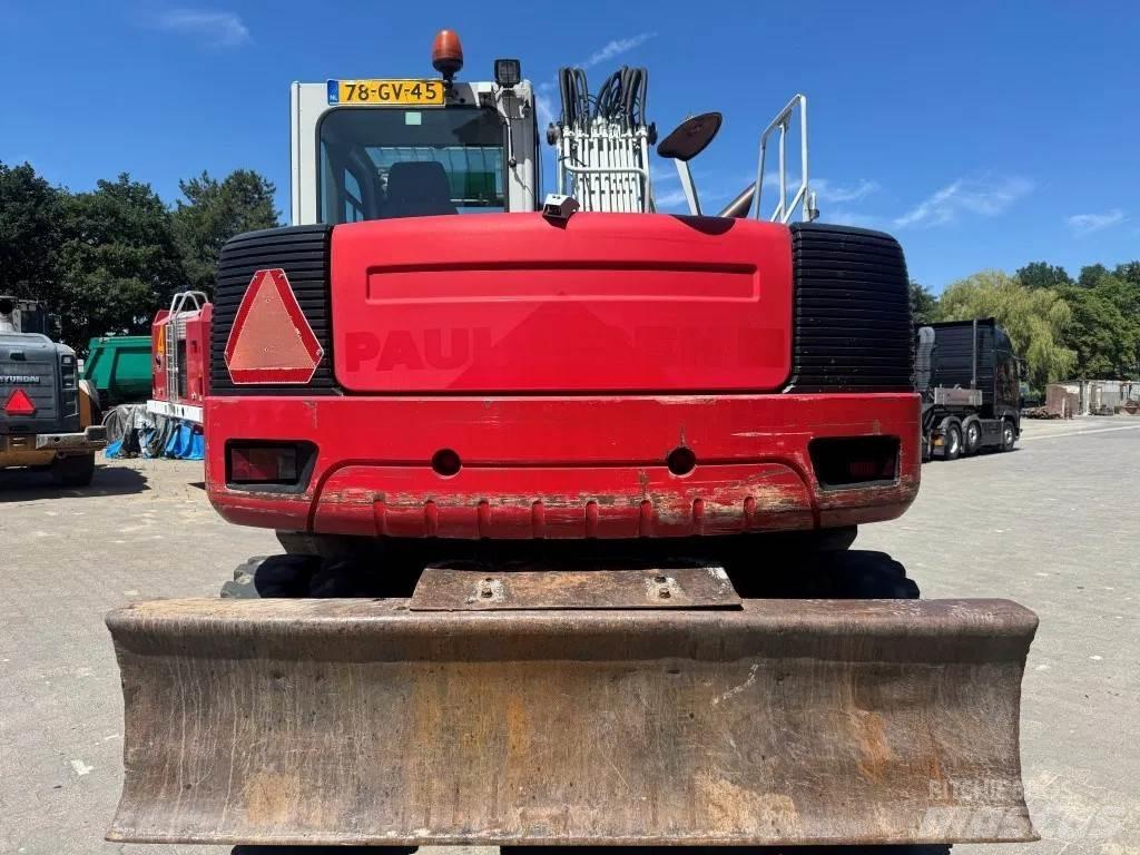 Takeuchi TB1160W Колёсные экскаваторы