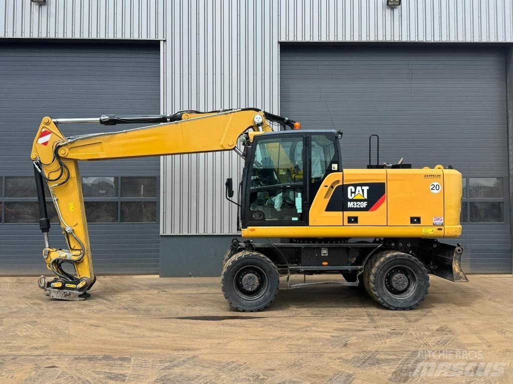 CAT M320F Колёсные экскаваторы
