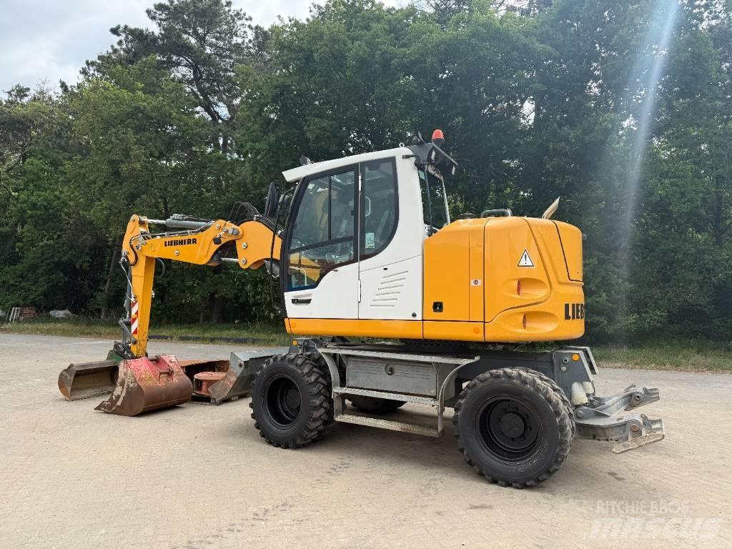 Liebherr A 910 Comp Колёсные экскаваторы
