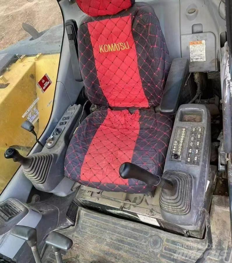 Komatsu PC78US Гусеничные экскаваторы