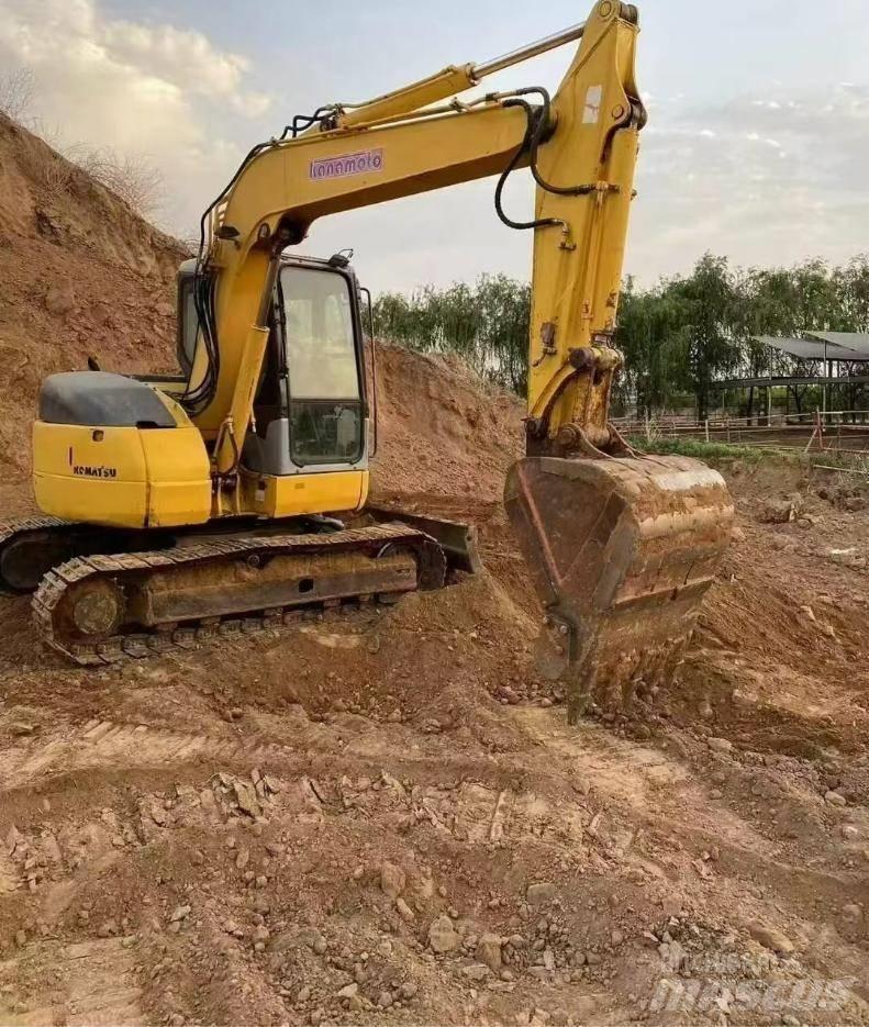 Komatsu PC78US Гусеничные экскаваторы