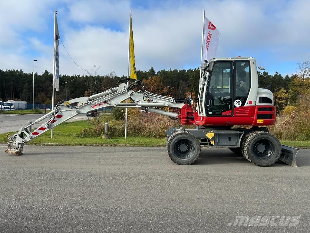 Takeuchi TB 395 W Колёсные экскаваторы