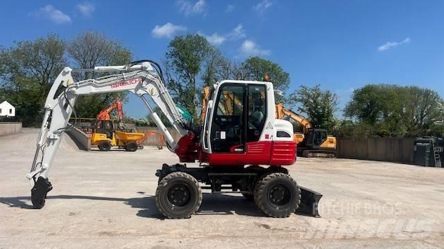 Takeuchi TB295W Колёсные экскаваторы