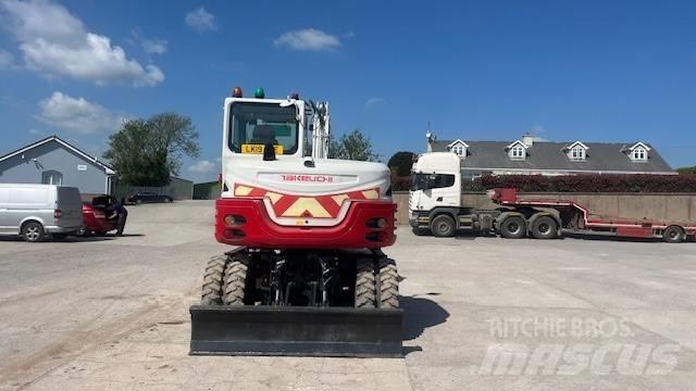 Takeuchi TB295W Колёсные экскаваторы
