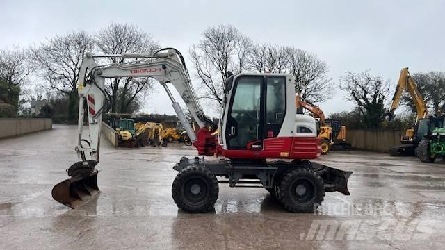 Takeuchi TB295W Колёсные экскаваторы