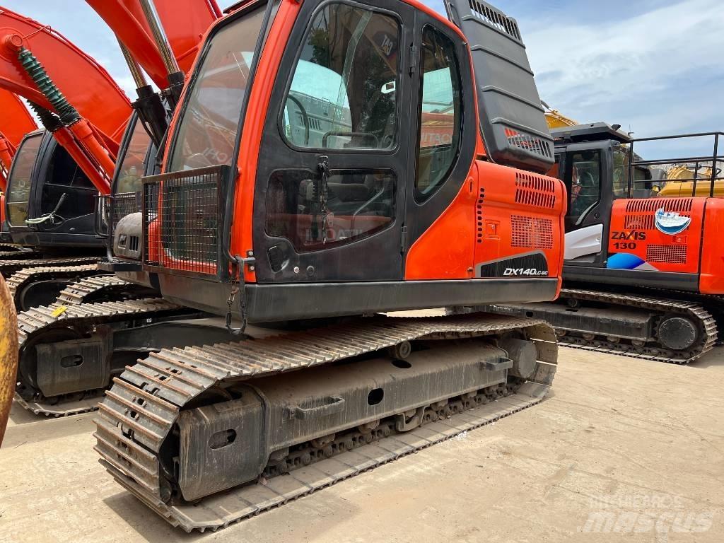 Doosan DX140 Гусеничные экскаваторы