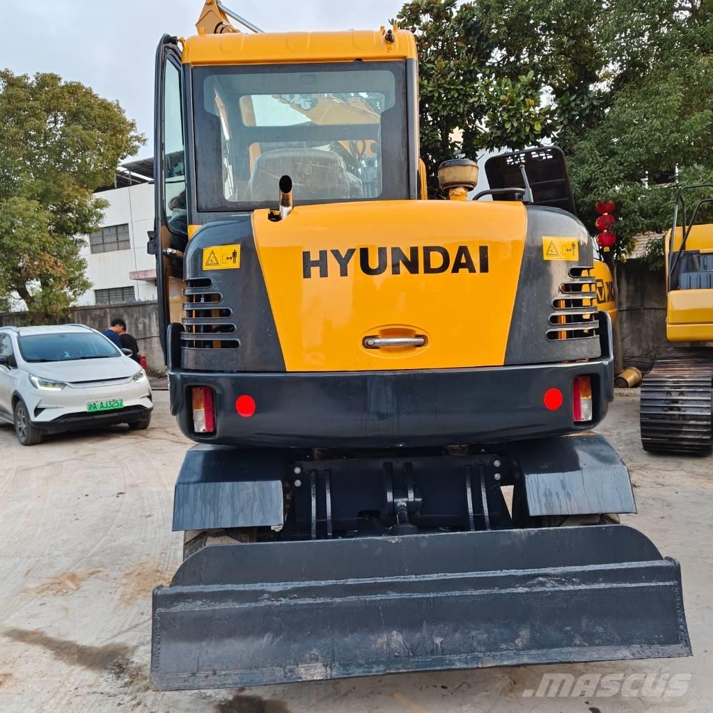 Hyundai 60 W VS Колёсные экскаваторы