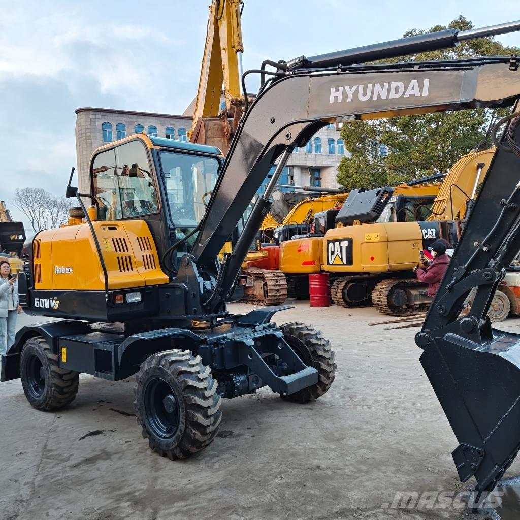 Hyundai 60 W VS Колёсные экскаваторы