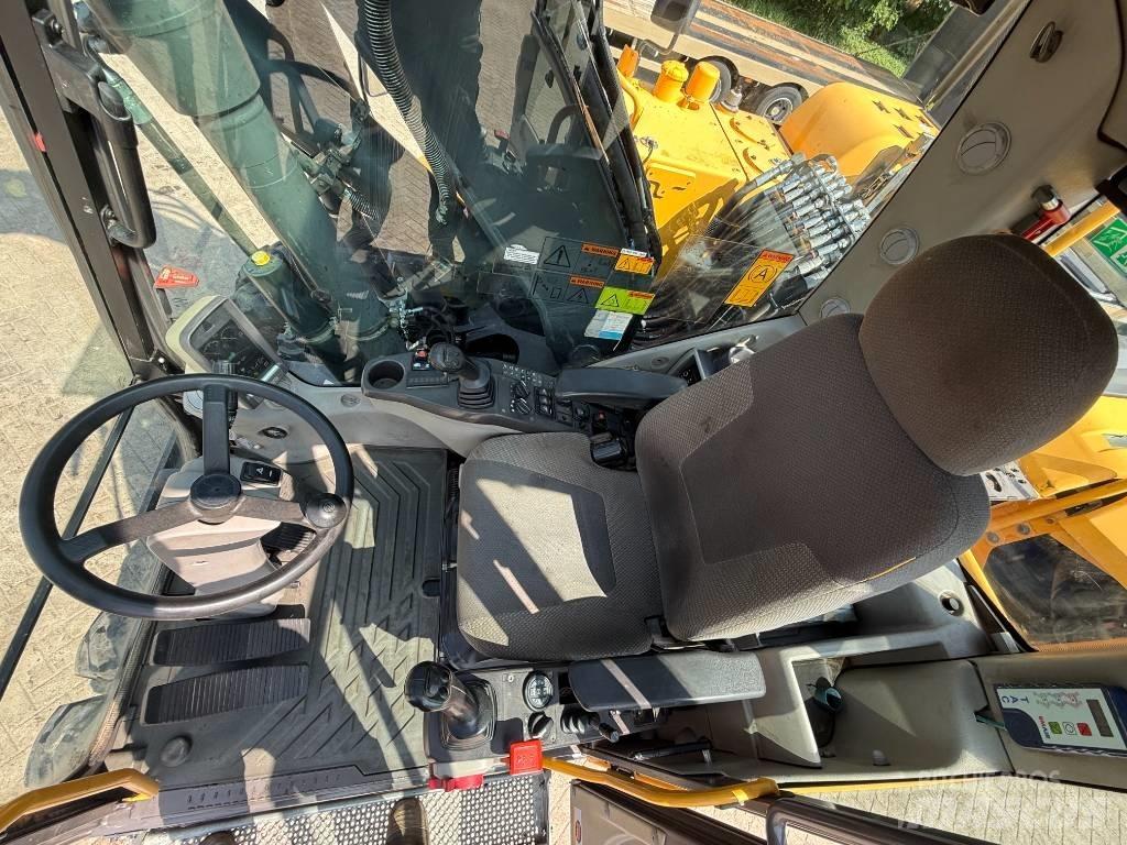 Volvo EW 140 D Колёсные экскаваторы