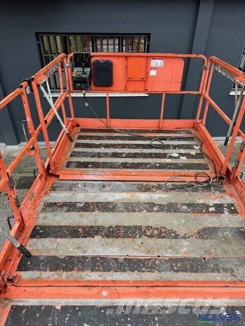 JLG 4394RT Ножничные подъемники