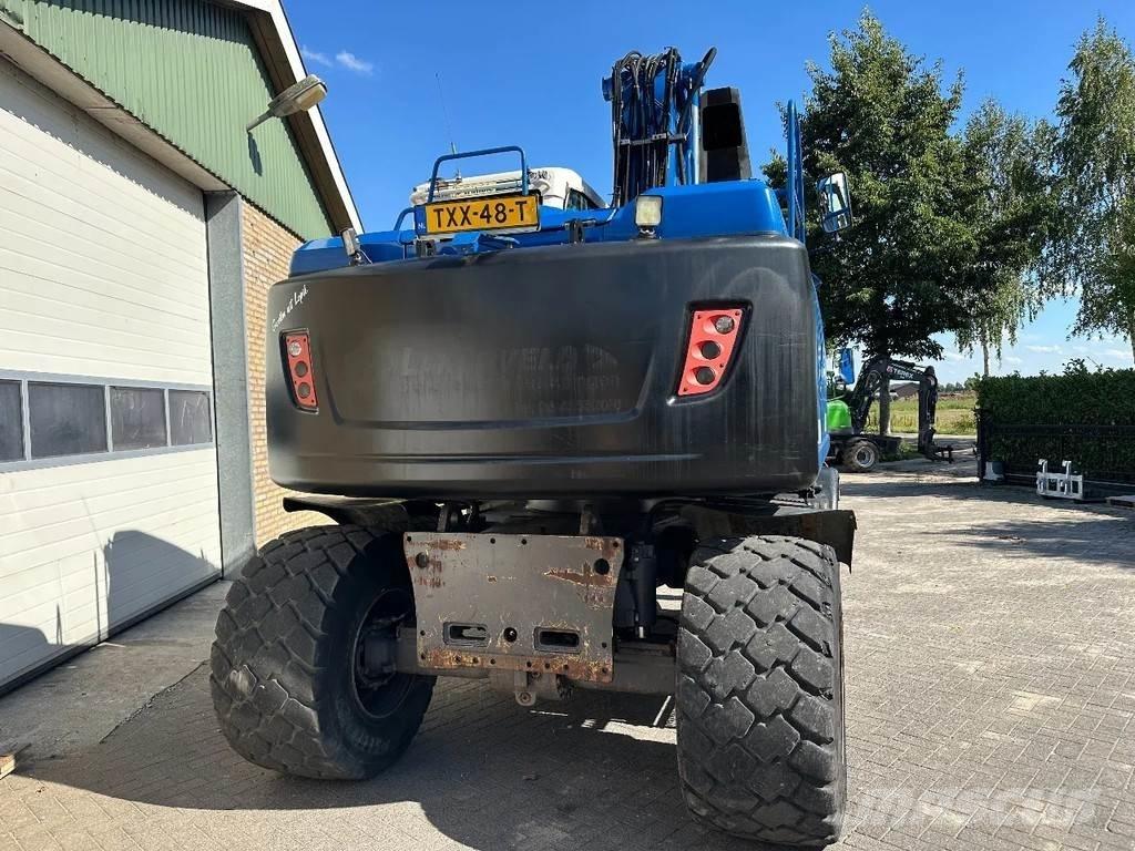 Volvo EW140D Колёсные экскаваторы