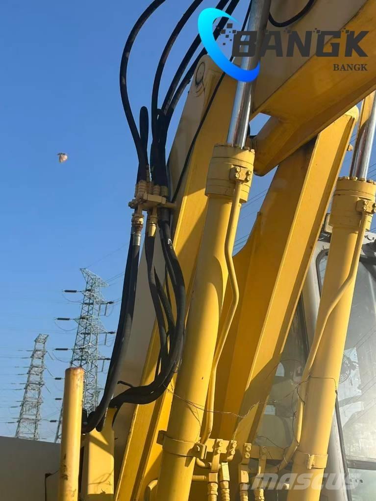 KOMΛ1'SU PW128us Колёсные экскаваторы