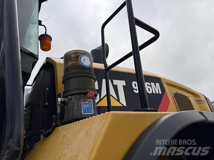 CAT 966M Фронтальные погрузчики