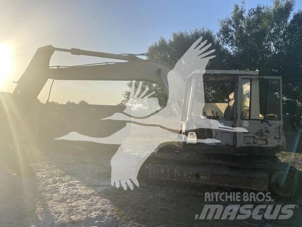 CAT 235B Гусеничные экскаваторы