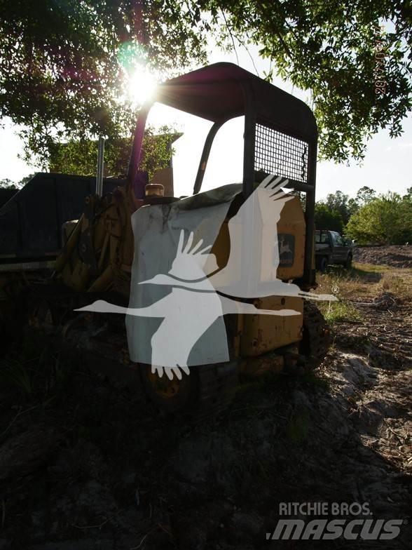 John Deere 450 Гусеничные фронтальные погрузчики