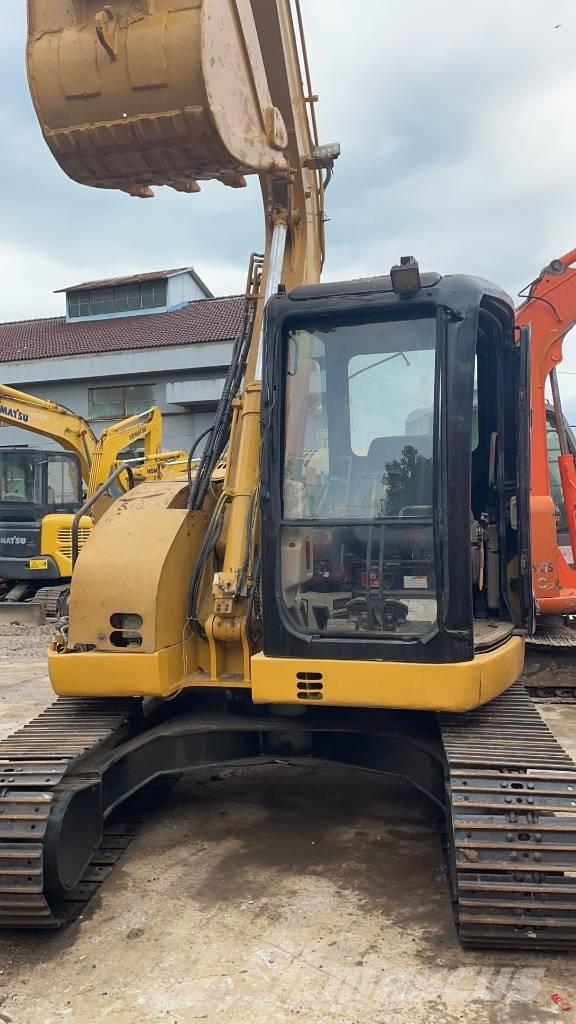 CAT 308C Малые экскаваторы 7т-12т